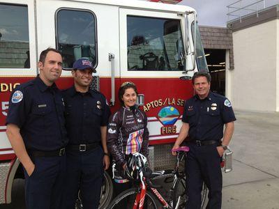 County resident Courtney Dimpel, who launched the idea for the Santa Cruz Police Memorial Bike Ride, stands with Ryan Peters, Brandon Houston, and Captain Greg Hansen of the Aptos/La Selva Fire District. (Contributed)