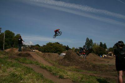 A rider flies over the Post Office Jumps during the Santa Cruz Mountain Bike Festival in Aptos last year. This is the first year the festival will offer a women's-only competition on the jumps. (Karen Kefauver/contributed)