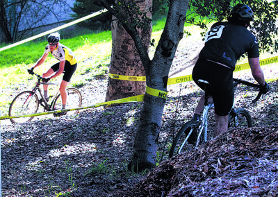 Shmuel Thaler/Sentinel Riders pass each other on a tight curve during the men's B race at the Surf City Cyclocross at harbor High School on Sunday. ( @Shmuel Thaler )