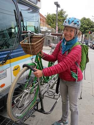 After at least 24 trips on Metro bus with her bike, Saskia Lucas is an expert at demonstrating the simple mechanism that secures the bike in the bus bike rack. Karen Kefauver — Contributed